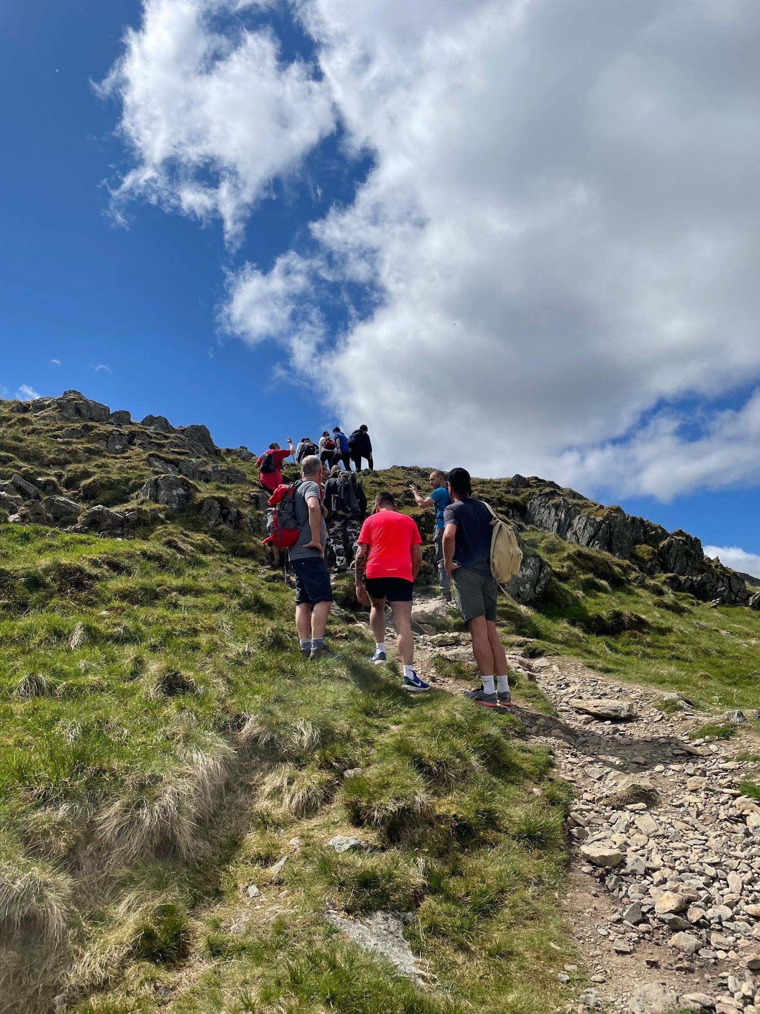 Hikers lining up to make their way over a fell in&nbsp;Glenridding, the Lake District. June 6, 2021.
