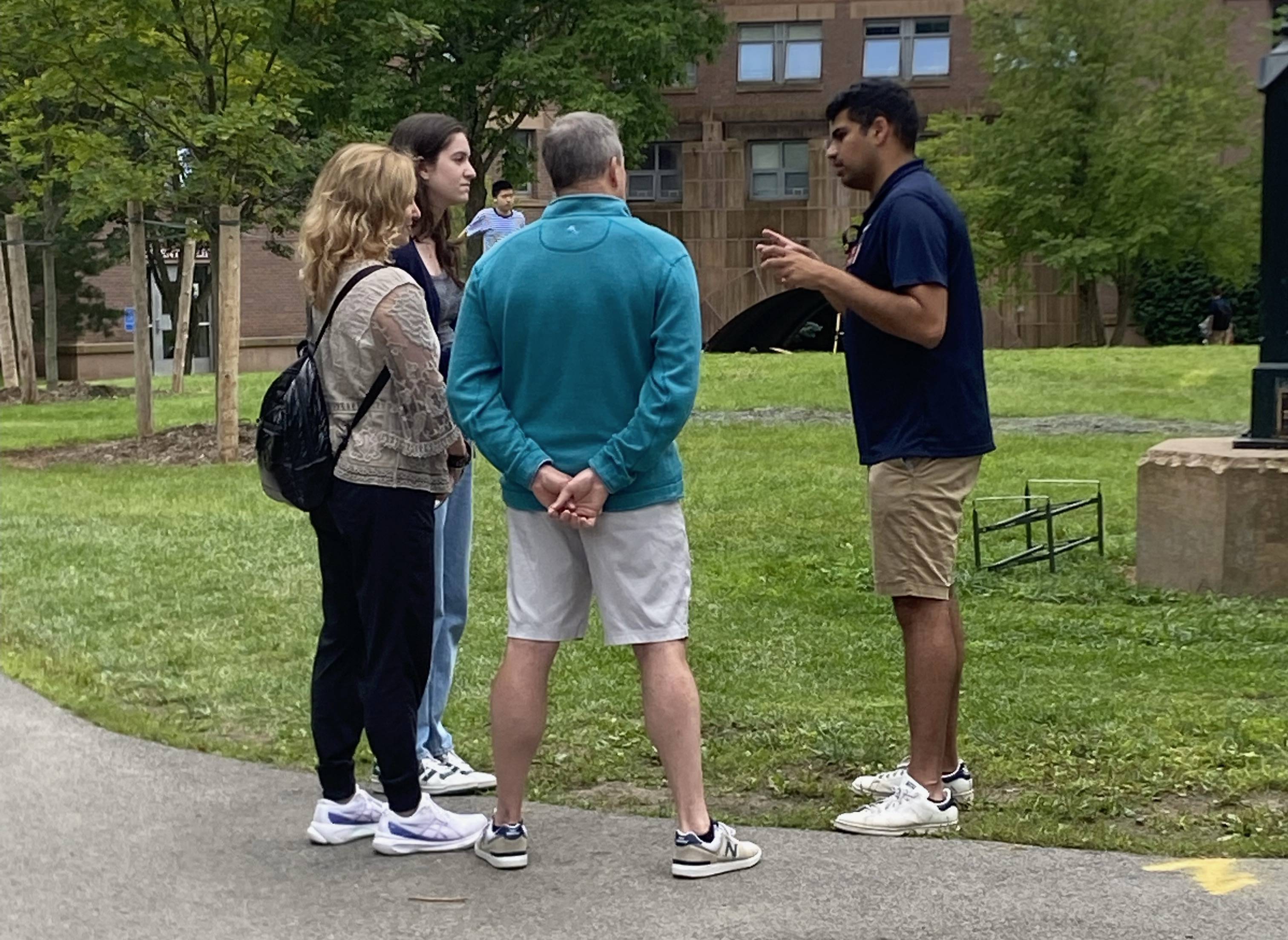 Nikhil giving a tour to prospective students as an Admission Ambassador