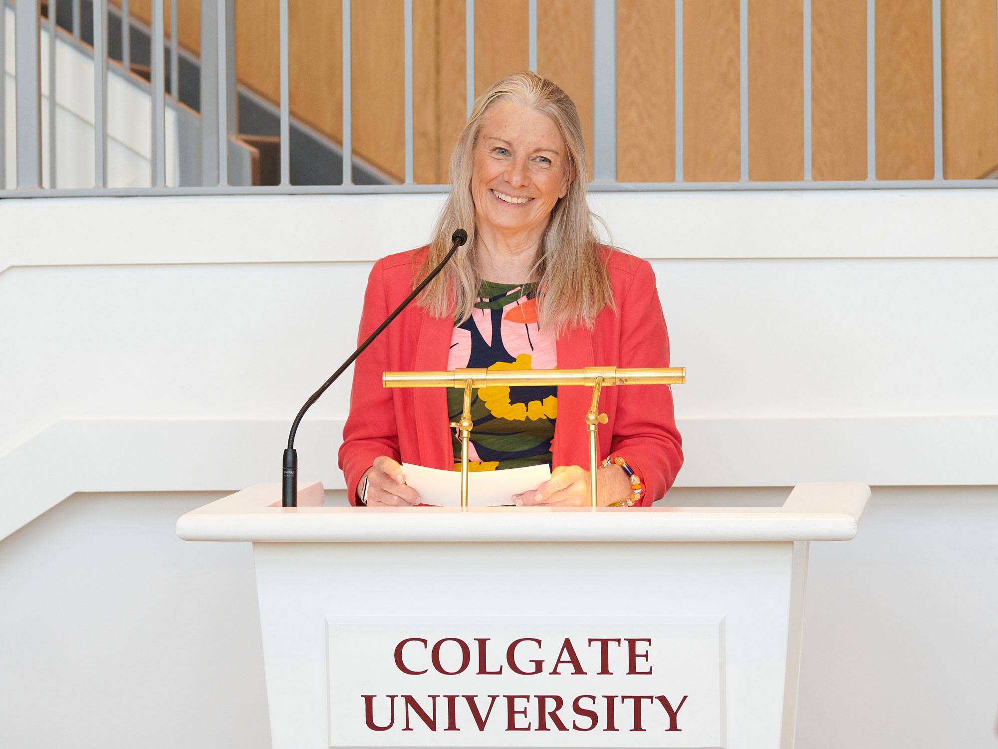 Professor Carrie Keating at podium